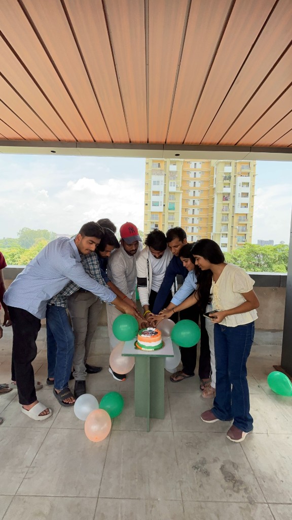 THF team cutting a cake
